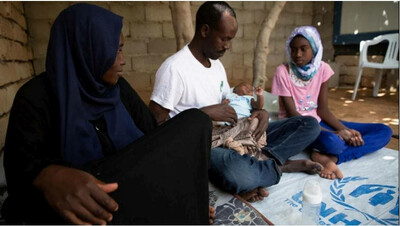 Une famille de réfugiés soudanais du Darfour à Tripoli en Libye, en juin 2020. Crédit : HCR / Mohamed Alalem