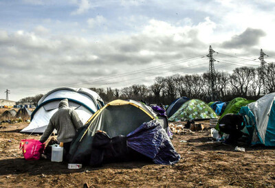 Un camp de migrants à Calais, le 18 février 2019. PHILIPPE HUGUEN / AFP